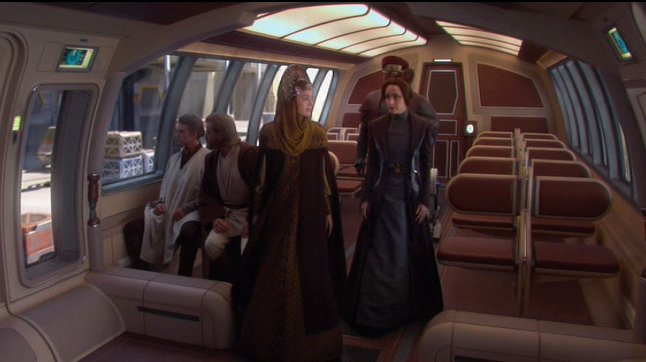 Dormé escorts Padmé to the front of the transport